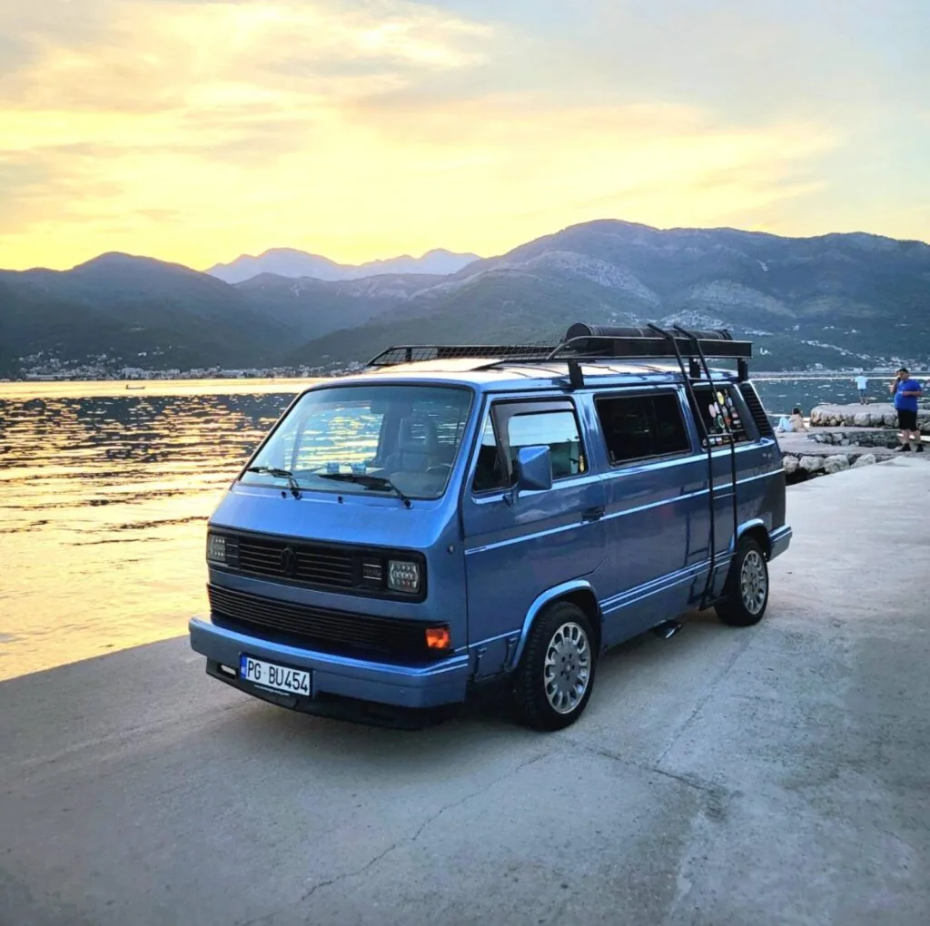 VW T3 Bluestar camper on a mountain viewpoint