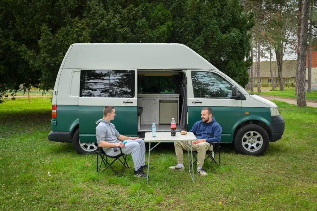 VW T5 High Top camper with outdoor table setup